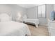 Well-lit bedroom featuring 2 twin beds with gray walls and white frame and furnishings at 601 Mitchell Dr. # 203, Myrtle Beach, SC 29577