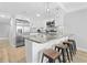 Bright, updated kitchen with stainless appliances, granite counters, and a breakfast bar with seating at 601 Mitchell Dr. # 203, Myrtle Beach, SC 29577
