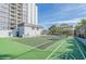 View of tennis court and players with the building in the background at 601 Mitchell Dr. # 203, Myrtle Beach, SC 29577