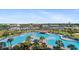 Aerial view of expansive pool complex with marina and waterfront views at 6095 Catalina Dr. # 1314, North Myrtle Beach, SC 29582