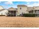 Wide open backyard space showing screen porch and natural landscaping at 6095 Catalina Dr. # 1314, North Myrtle Beach, SC 29582