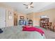 Spacious bedroom featuring a comfortable bed, closet and a bookshelf at 6095 Catalina Dr. # 1314, North Myrtle Beach, SC 29582