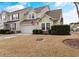 Inviting two-story townhouse with attached garage and well-maintained front lawn in a residential neighborhood at 6095 Catalina Dr. # 1314, North Myrtle Beach, SC 29582