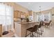 Bright kitchen featuring granite countertops, an island with bar stools, and an open layout for easy entertaining at 6095 Catalina Dr. # 1314, North Myrtle Beach, SC 29582