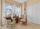 Cozy sitting room with wicker chairs, tile flooring, and ample natural light at 6095 Catalina Dr. # 1314, North Myrtle Beach, SC 29582