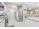 Spacious kitchen featuring stainless steel appliances, tile flooring and backsplash, plus granite countertops at 70 Addison Cottage Way # 121 & 32, Murrells Inlet, SC 29576