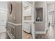 Convenient laundry room featuring modern washer and dryer, stylish cabinets, and neutral paint at 70 Addison Cottage Way # 121 & 32, Murrells Inlet, SC 29576