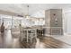 Open-concept living space blending the dining area, kitchen, and living room for easy interaction and entertaining at 70 Addison Cottage Way # 121 & 32, Murrells Inlet, SC 29576
