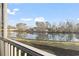 Beautiful water view from screened porch with calm water and blue sky at 70 Addison Cottage Way # 121 & 32, Murrells Inlet, SC 29576
