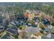 An aerial view captures this home nestled among lush trees in a cul-de-sac of a well-planned neighborhood at 1019 Hillsdale Dr., Little River, SC 29566