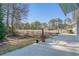 Wide shot of a backyard featuring a concrete patio and fence at 1019 Hillsdale Dr., Little River, SC 29566