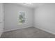 Bedroom featuring neutral paint, carpet, and a window at 1019 Hillsdale Dr., Little River, SC 29566