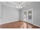 Dining room with hardwood floors, modern chandelier, and glass doors leading to the outside at 1019 Hillsdale Dr., Little River, SC 29566