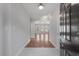 Open entryway with hardwood floors leading to a light-filled living area at 1019 Hillsdale Dr., Little River, SC 29566