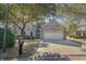 Charming single-story home featuring a brick facade, well-maintained landscaping, and an attached two-car garage at 1019 Hillsdale Dr., Little River, SC 29566