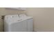 Laundry room with white washer and dryer at 1019 Hillsdale Dr., Little River, SC 29566