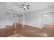 Open-concept living area with hardwood floors, connecting to other living spaces at 1019 Hillsdale Dr., Little River, SC 29566