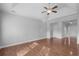 Bright and airy living room with hardwood floors and neutral walls at 1019 Hillsdale Dr., Little River, SC 29566
