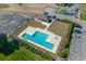 An aerial view of the neighborhood pool and surrounding area that includes parking and a covered area at 1019 Hillsdale Dr., Little River, SC 29566