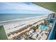 Beach and ocean views from a balcony overlooking the pool area at 1105 S Ocean Blvd. # 1106, Myrtle Beach, SC 29577