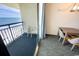 Ocean view balcony with seating area, accessible from the dining area at 1105 S Ocean Blvd. # 1106, Myrtle Beach, SC 29577
