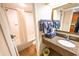 Bathroom featuring granite vanity, large mirror, and combined tub and shower at 1105 S Ocean Blvd. # 1106, Myrtle Beach, SC 29577