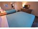 A comfortable room featuring two beds, a TV, and access to a kitchenette; ideal for a relaxing and convenient stay at 1105 S Ocean Blvd. # 1106, Myrtle Beach, SC 29577