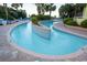 Relaxing lazy river with clear water and lush landscaping, providing a tranquil and enjoyable experience at 1105 S Ocean Blvd. # 1106, Myrtle Beach, SC 29577