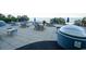 Relaxing pool deck featuring lounge chairs and umbrellas overlooking a pristine ocean view at 1105 S Ocean Blvd. # 1106, Myrtle Beach, SC 29577