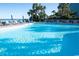 Relaxing outdoor swimming pool surrounded by lounge chairs and umbrellas at 1105 S Ocean Blvd. # 1106, Myrtle Beach, SC 29577