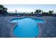 Shallow pool with an adjacent brick patio and blue lounge chairs, perfect for relaxation with views of the ocean at 1105 S Ocean Blvd. # 1106, Myrtle Beach, SC 29577