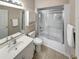 Clean bathroom with a shower-tub combo, vanity, and tile flooring at 601 Hillside Dr. N # 4535, North Myrtle Beach, SC 29582