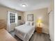 Cozy bedroom with wood floors and natural light from the window at 601 Hillside Dr. N # 4535, North Myrtle Beach, SC 29582