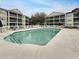 Inviting community pool with surrounding lounge chairs and well-maintained landscaping and multi-story residential buildings at 601 Hillside Dr. N # 4535, North Myrtle Beach, SC 29582