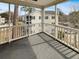 Spacious screened porch with a view of the surrounding buildings and lush greenery, perfect for outdoor living at 601 Hillside Dr. N # 4535, North Myrtle Beach, SC 29582
