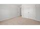 Carpeted bedroom with a closet and white walls and trim at 632 Woodside Dr., Conway, SC 29526