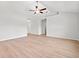 Open and spacious living room featuring sleek hardwood floors and an airy, neutral color palette at 632 Woodside Dr., Conway, SC 29526