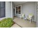 Inviting front porch with comfortable seating and manicured landscaping, offering great curb appeal at 725 Salerno Circle # A, Myrtle Beach, SC 29579