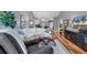 Inviting living room featuring a white sofa, leather recliner, and hardwood floors at 725 Salerno Circle # A, Myrtle Beach, SC 29579