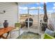 Relaxing screened porch with seating area and view of the landscaped backyard and pond beyond at 725 Salerno Circle # A, Myrtle Beach, SC 29579