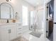 Bathroom boasts marble tile, modern fixtures, a shower with glass door, and large single sink at 780 Old Murrells Inlet Rd., Murrells Inlet, SC 29576