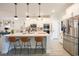 Modern kitchen with white cabinets, stainless steel appliances, a center island with seating, and pendant lights at 780 Old Murrells Inlet Rd., Murrells Inlet, SC 29576