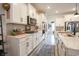 Beautiful kitchen featuring white cabinetry, stainless steel appliances, and stylish backsplash, perfect for cooking at 780 Old Murrells Inlet Rd., Murrells Inlet, SC 29576