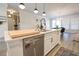 Spacious kitchen island with stainless steel dishwasher, sink, and ample counter space for food preparation at 780 Old Murrells Inlet Rd., Murrells Inlet, SC 29576