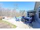 Outdoor pool area with patio furniture surrounded by trees at 780 Old Murrells Inlet Rd., Murrells Inlet, SC 29576