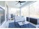 Comfortable screened porch with seating area overlooking a backyard at 780 Old Murrells Inlet Rd., Murrells Inlet, SC 29576