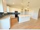 Spacious kitchen with white cabinets, a large island, and stainless steel appliances at 8628 Farrier Dr., Myrtle Beach, SC 29588