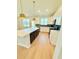 Well-lit kitchen with an island, offering plenty of counter space and storage at 8628 Farrier Dr., Myrtle Beach, SC 29588