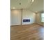 Modern living room showcasing a sleek electric fireplace at 8628 Farrier Dr., Myrtle Beach, SC 29588