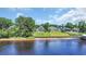 An aerial view of waterfront homes with lawns and private access to the water and beach at 9785 Anchor Dr., Longs, SC 29568